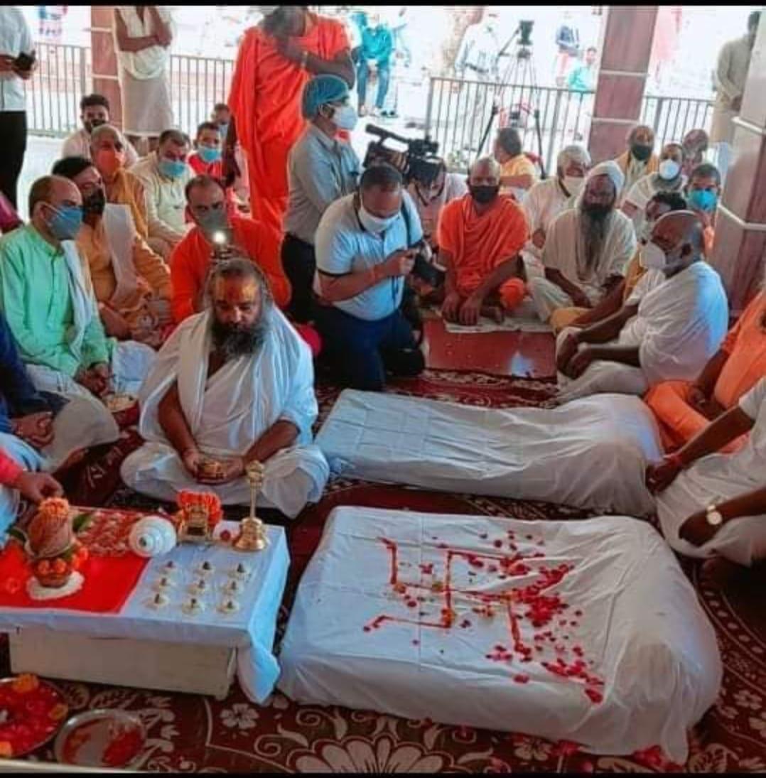 Devotees receiving blessings during puja